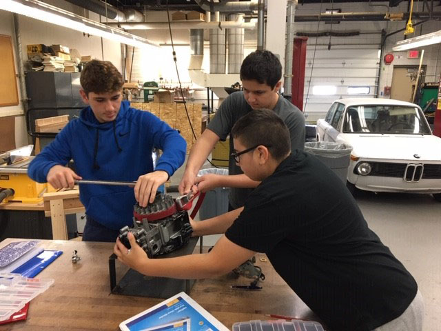 students working together on a technology project